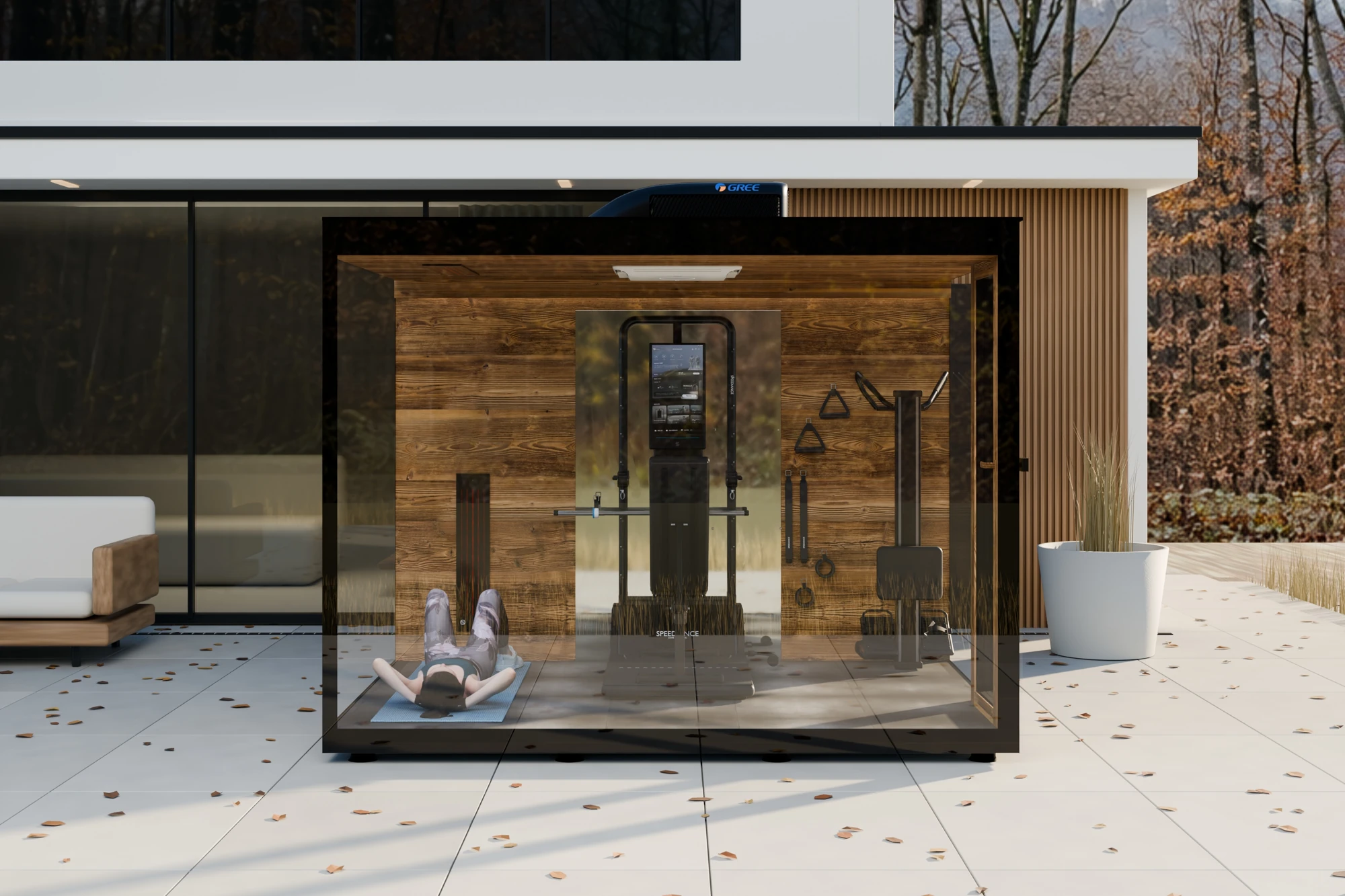 The actual GrandeGym glass and wood pavilion on a stone terrace, with its original training equipment and infrared heater visible inside